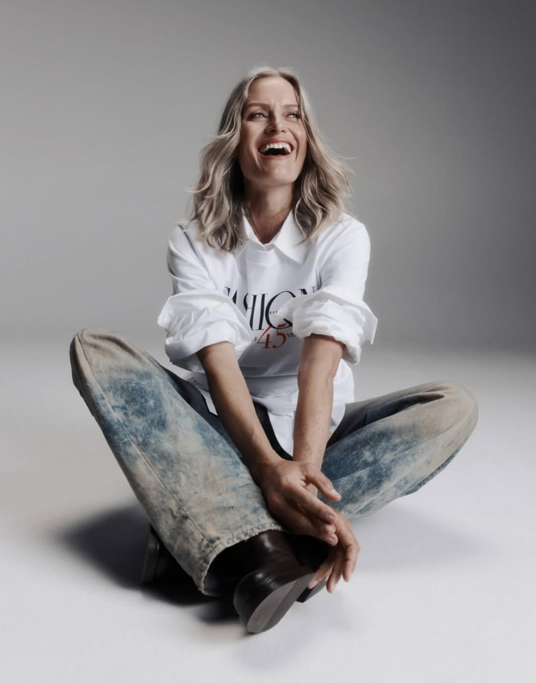 Photo of Carrie Berkey, seated, smiling